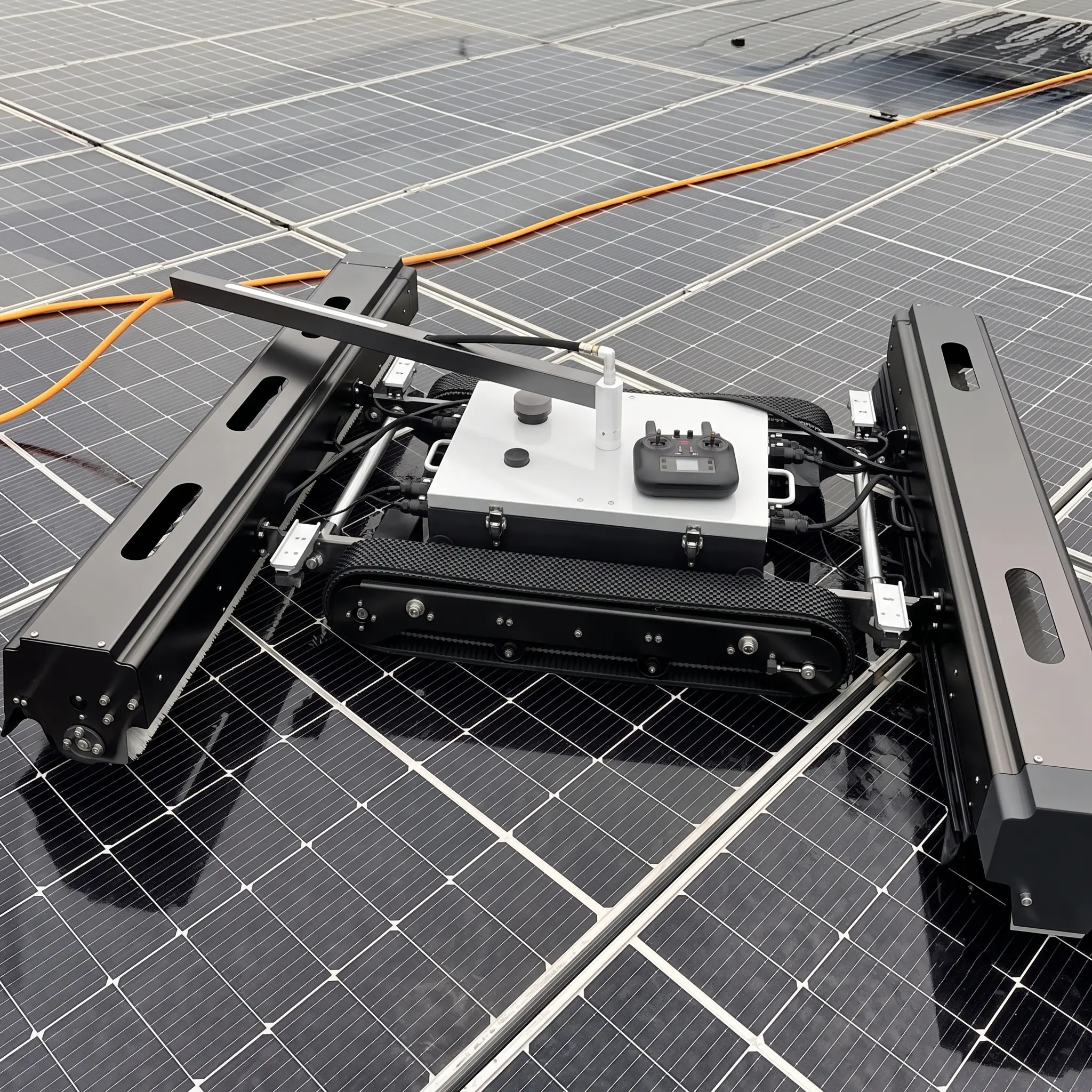 OpenDroids robot on a commercial rooftop solar array with building edge and skyline visible